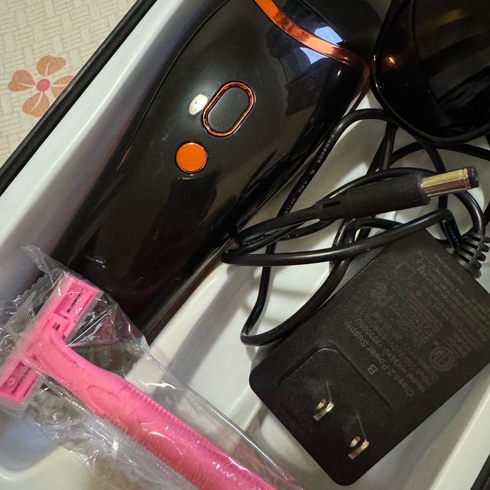 Black and Orange Hair Removal Device